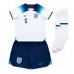 Camisa de Futebol Inglaterra John Stones #5 Equipamento Principal Infantil Mundo 2022 Manga Curta (+ Calças curtas)